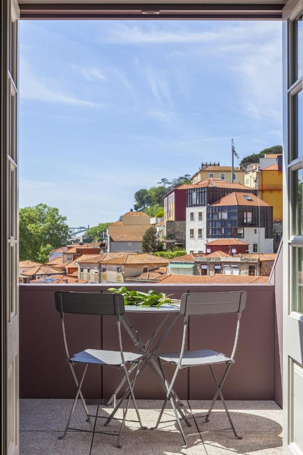 Timbre Virtudes Hotel Porto Luaran gambar View from the balcony of a typical apartment